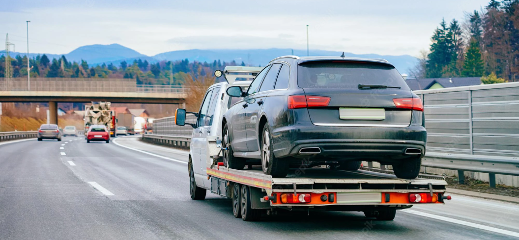 Dépanneuse en pleine intervention sur l'autoroute